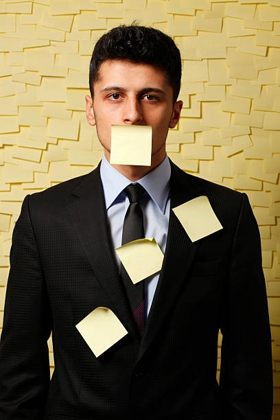 klebezettel - careless businessman adhesive note business stock-fotos und bilder