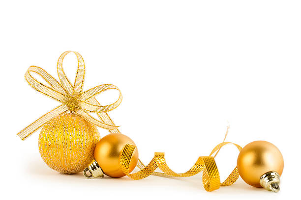 istock Gold Christmas baubels with ribbon isolated on white 174997286