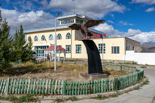 Ulgii airport, located Ulgii, which is the capital of the Bayan-Ulgii province of Western Mongolia.  Located at an altitude of 1,730 metres, the small airport is a destination for visitors and residents coming and going to and from the Altai Mountain area. A bronze Golden eagle statue is located close to the building.