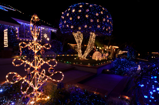 Beautiful outdoors Christmas decorations on a home and lawn