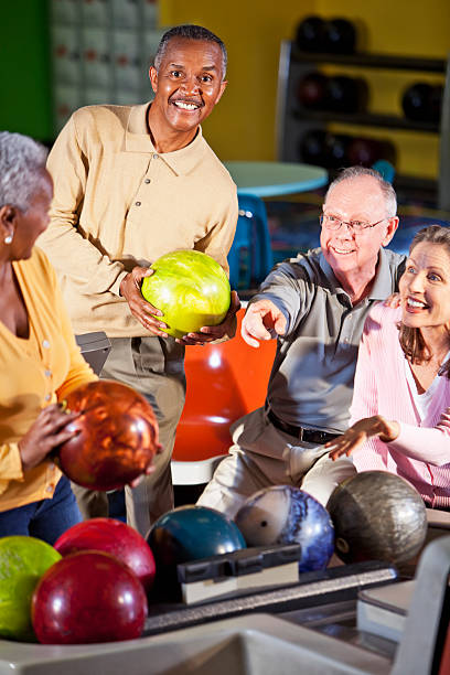 istock Seniors at bowling alley 174998397