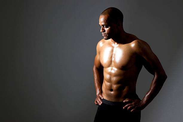 fit man - exercising motivation looking up african descent zdjęcia i obrazy z banku zdjęć