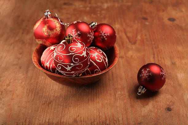 Red Decorative Christmas Balls And A Garland In The Basket. NOTE: Shallow Depth Of Field