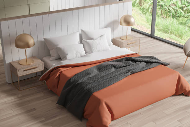 istock Top view of light bedroom interior with bed and accent wall, panoramic window 1749998056