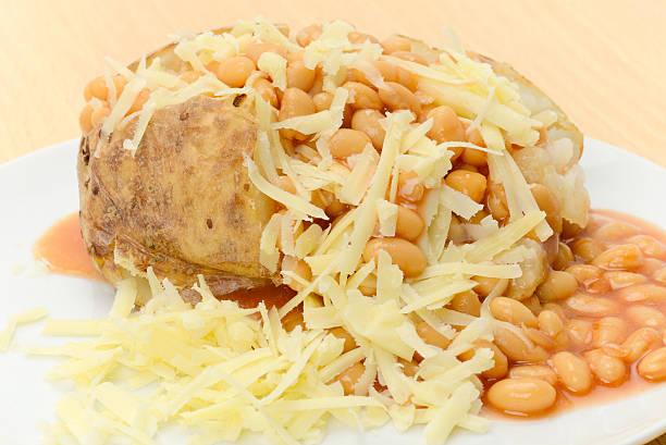 istock Baked jacket potato filled with beans and cheese 175000054