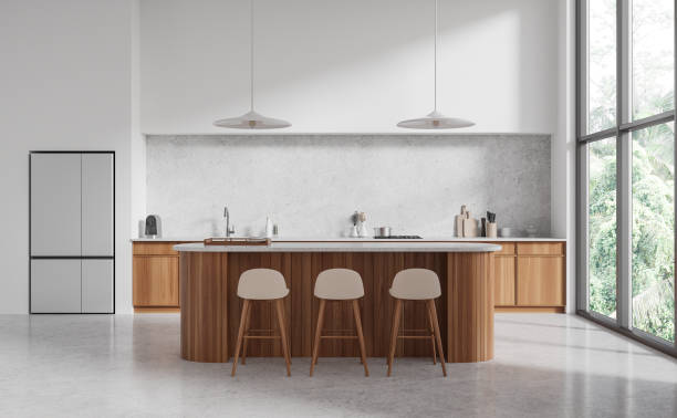 istock Cozy hotel kitchen interior with bar counter, cooking area and panoramic window 1750001205