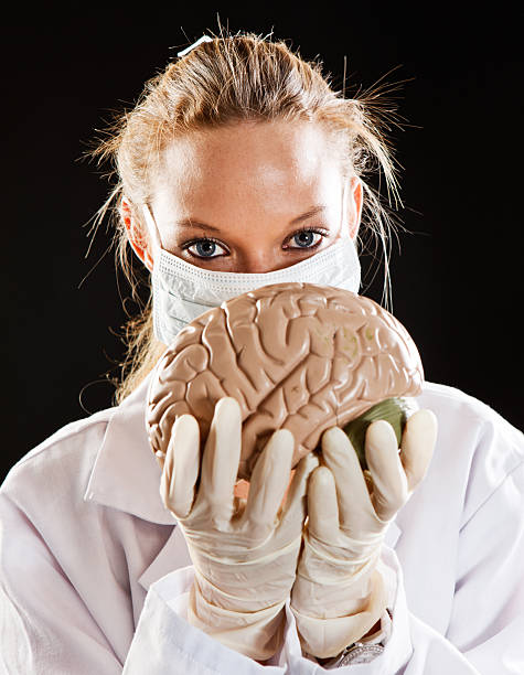 young. ploceus feminino médico escrever modelo de cérebro - re2012005 vertical looking at camera waist up - fotografias e filmes do acervo
