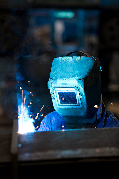 istock Arc welder with welding sparks 175001374