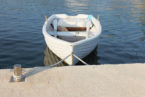 istock turquoise blue mediterranean ocean and white row boat Croatia 175001392