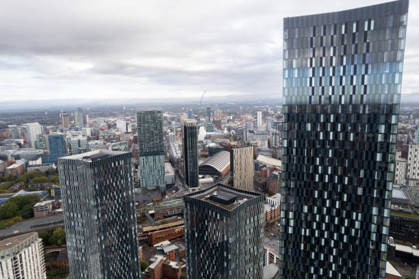 istock Manchester City Centre Drone Aerial View Above Building Work Skyline Construction Blue Sky 2023 Deansgate 1750049176
