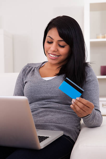 istock Young Woman Shopping Online 175005195