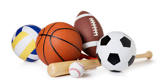 This is a photo of a variety of balls and sporting equipment isolated on a white background. There is a clipping path included with this file.