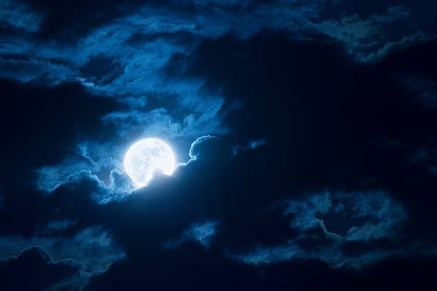 istock Dramatic Nighttime Clouds and Sky With Beautiful Full Blue Moon 175006314