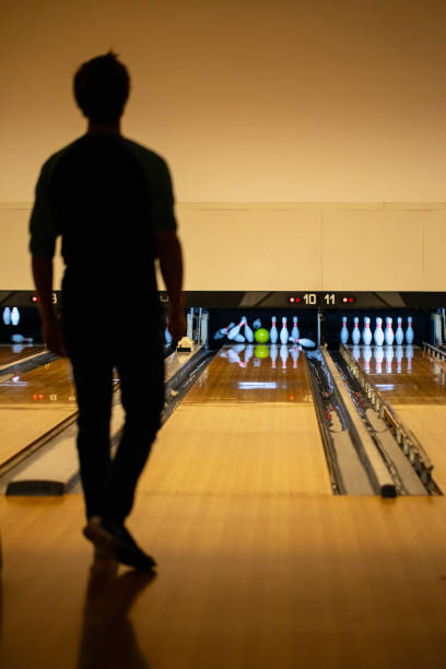 istock Silhouette of Adult Man Bowling 1750107280