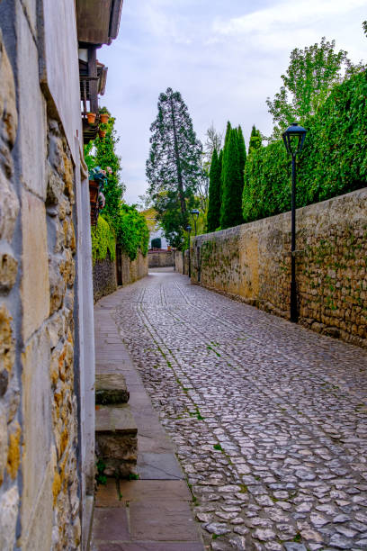 istock Medieval street with cobblestone road 1750107834