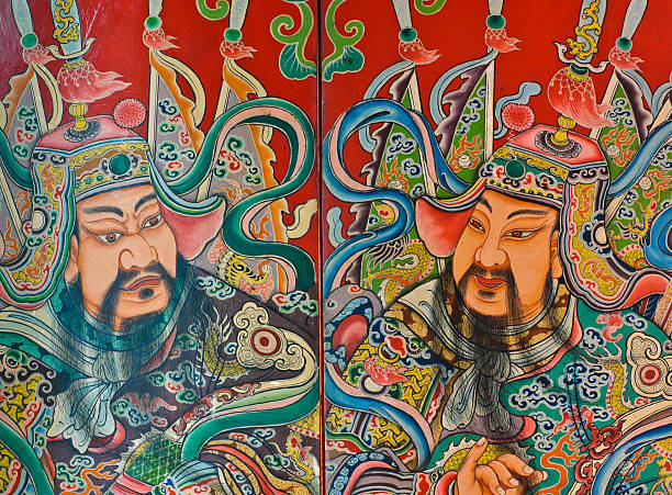 God painting in traditional Chinese style on temple door at Wat Sam Phraya in Bangkok, Thailand.