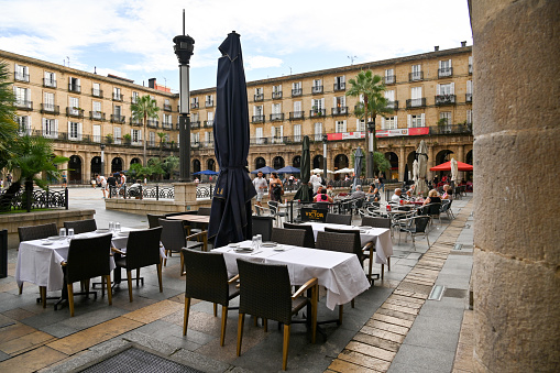 Bilbao, Spain, October 17, 2023 - The Plaza Nueva or Plaza Barria (New Square) of Bilbao is a monumental square of Neoclassical style built in 1821. in the old town of Bilbao, Spain.
