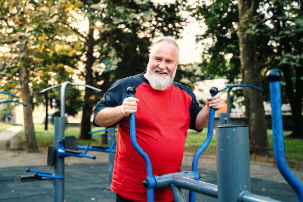 istock Senior man working out in outdoor gym on a step machine 1750142871