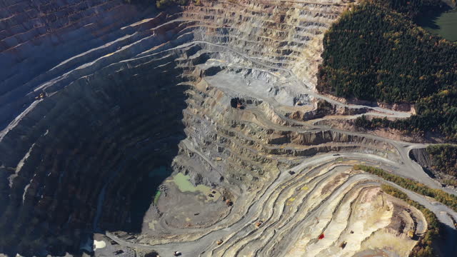 Aerial view of an open pit copper mine. Rosia Montana, Romania by drone