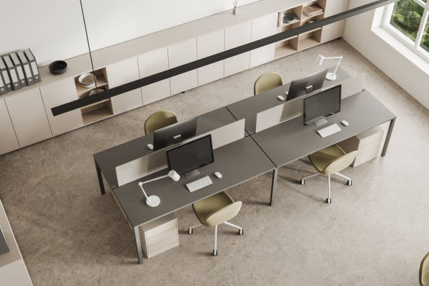 istock Top view of work zone interior with desk and pc desktop, panoramic window 1750181932