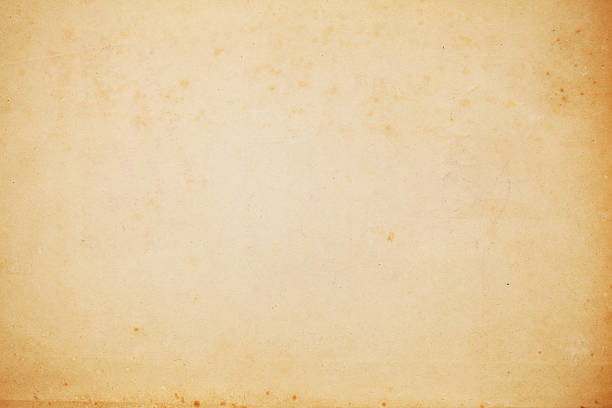 istock old yellow paper background with scratches 175018548