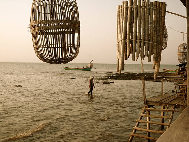 Catching Crabs Taken from a crab restaurant view in Kep, Cambodia kep stock pictures, royalty-free photos & images