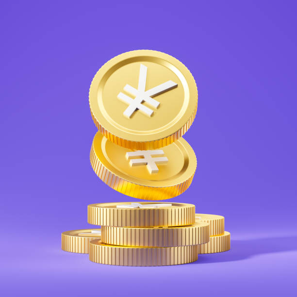 istock Stack of Chinese yuan coins over blue 1750212203
