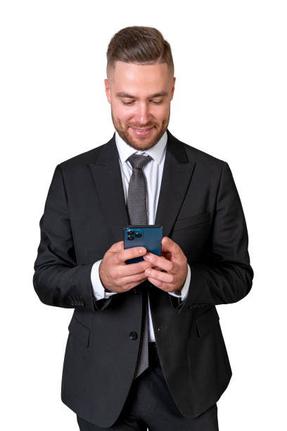 istock Businessman with smartphone in hands, smiling. Isolated over white background 1750223810