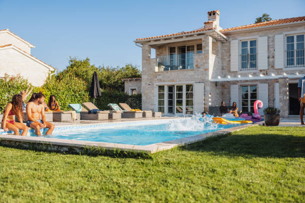 istock Relaxing Pool Party With Friends 1750225472
