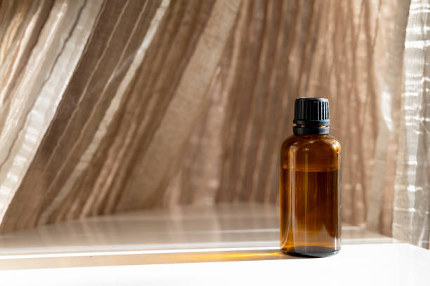 istock Mock-up Amber glass bottle with natural background 1750246226