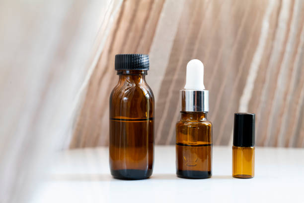 istock Mock-up Amber glass bottle with natural background 1750246761