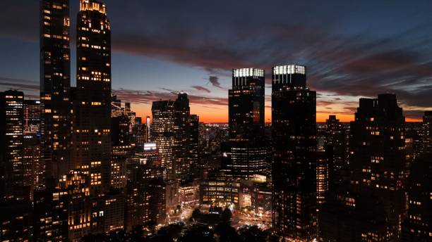 istock a city skyline is lit up by buildings at sunset time 1750291461