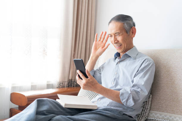 istock Old man on the phone 1750297858