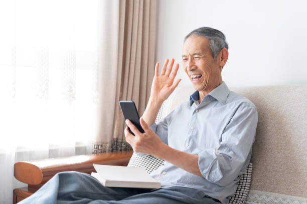 istock Old man on the phone 1750298370