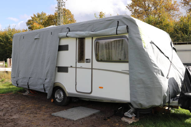 istock a caravan with a gray tarpaulin 1750319111