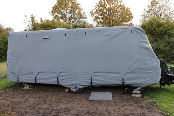 istock a caravan with a gray tarpaulin 1750319291