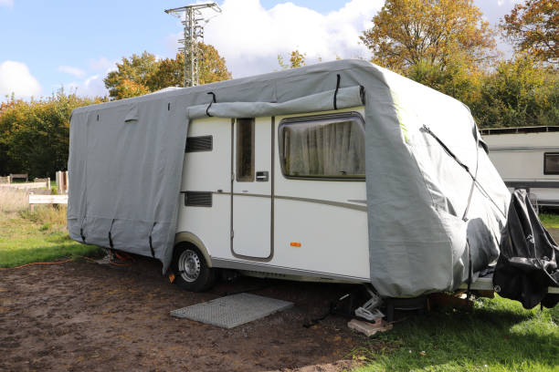 istock a caravan with a gray tarpaulin 1750337622