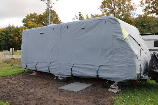istock a caravan with a gray tarpaulin 1750337623
