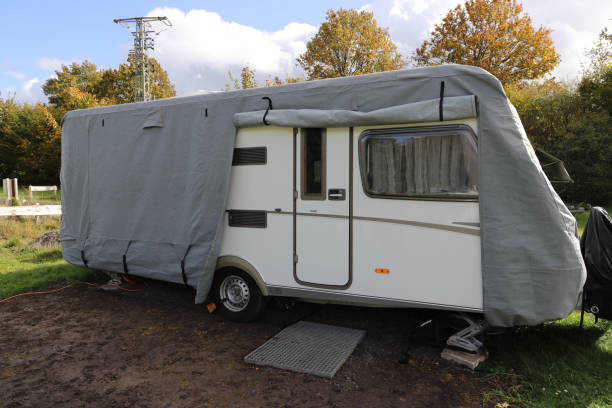 istock a caravan with a gray tarpaulin 1750337628
