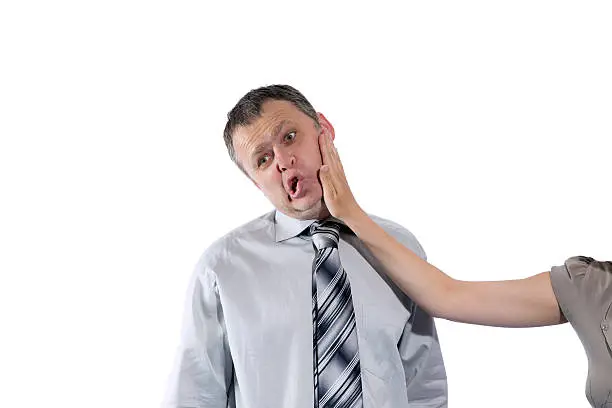 Photo of Woman hand slapping man's face