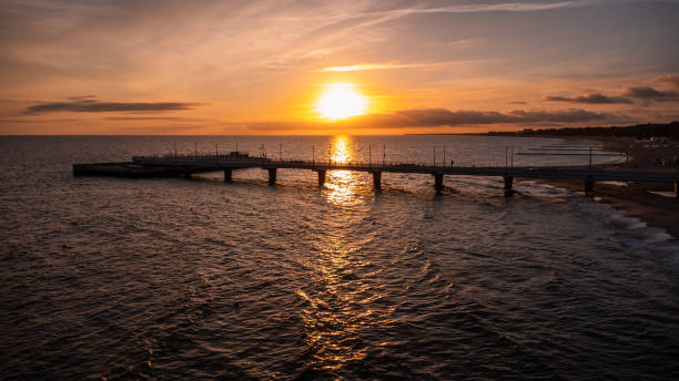istock A pier at sunrise on the Baltic Sea 1750344332