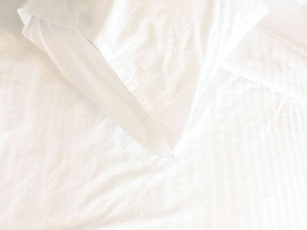 istock White Pillow On Bed And With Wrinkle Messy Blanket In Bedroom, From Sleeping In A Long Night Winter 1750358853