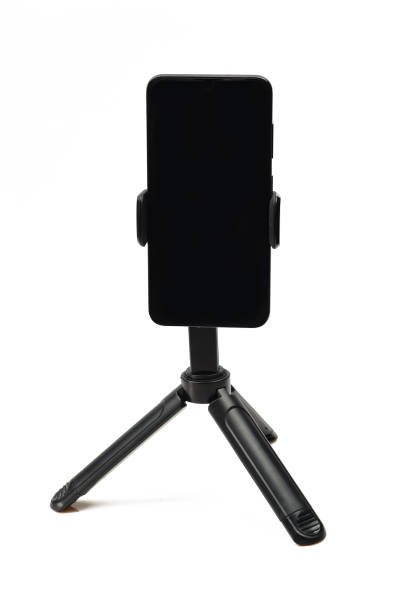istock Smartphone on tripod stand isolated on white background 1750359960