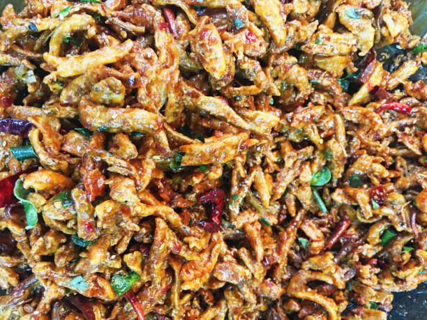 istock Deep fried salted fish topped with green coriander and red chili 1750405687