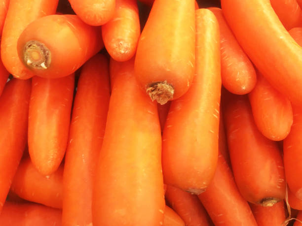 istock Bunch of fresh orange Carrots 1750420722
