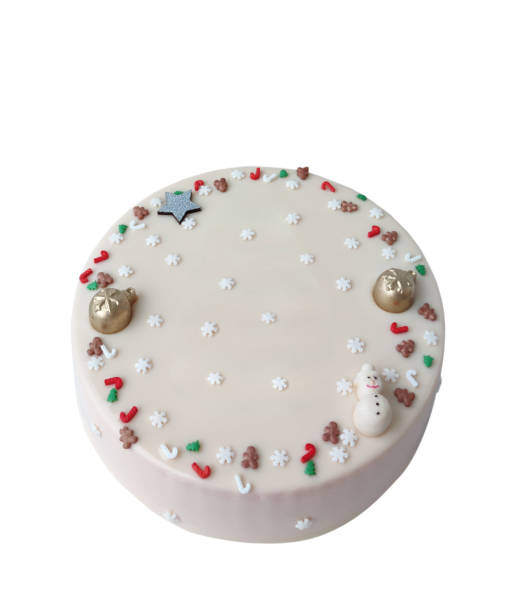 istock Christmas pink cake decorated with snowflakes, isolated on white background 1750431552