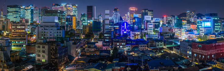 The crowded neon cityscape of central Seoul at night, South Korea.