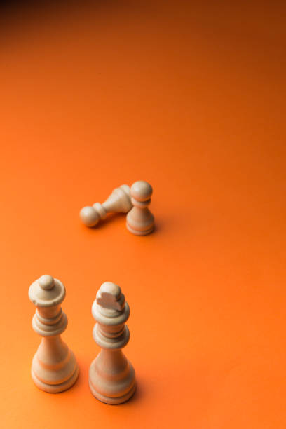 istock Wooden chess figurines on blue background. 1750452404