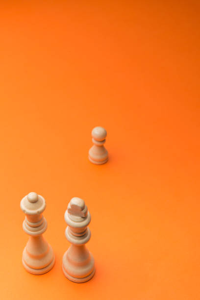 istock Wooden chess figurines on blue background. 1750453580