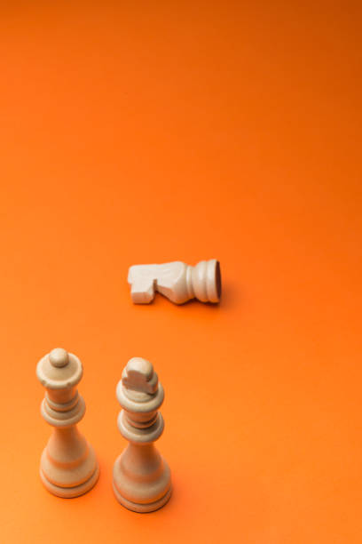 istock Wooden chess figurines on blue background. 1750454912